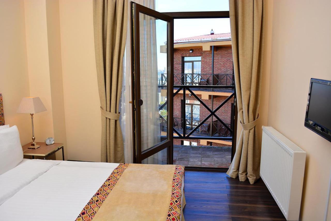 Urban Lodge Hotel Rooms And Suits تبليسي المظهر الخارجي الصورة